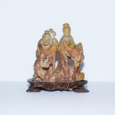 Carved soapstone figure group, China, mid Qing Dynasty, 18th/ 19th century